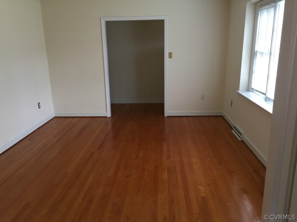 50 Arkwright Road North Chesterfield, VA 23236 - Photo 10 of 16 an empty room with wooden floor and windows