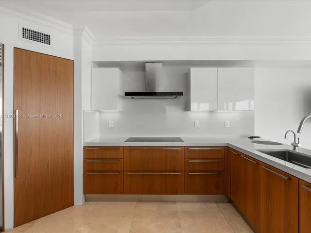 a view of kitchen and dining room with wooden floor