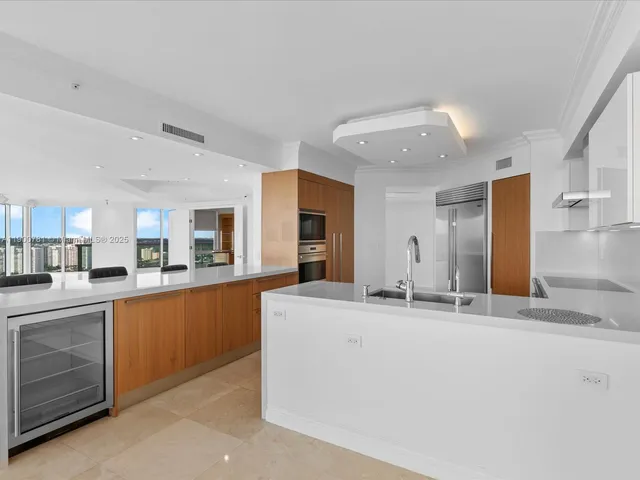 a picture of a bathroom with a sink and mirror