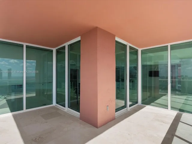 a view of a bedroom with a potted plant