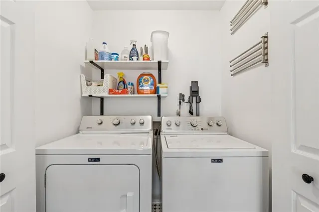 a utility room with dryer and washer
