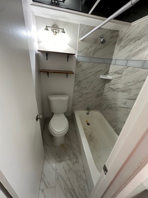 3400 Timmons Lane, Unit 24 Houston, TX 77027 - Photo 3 of 21 a bathroom with a toilet and a sink