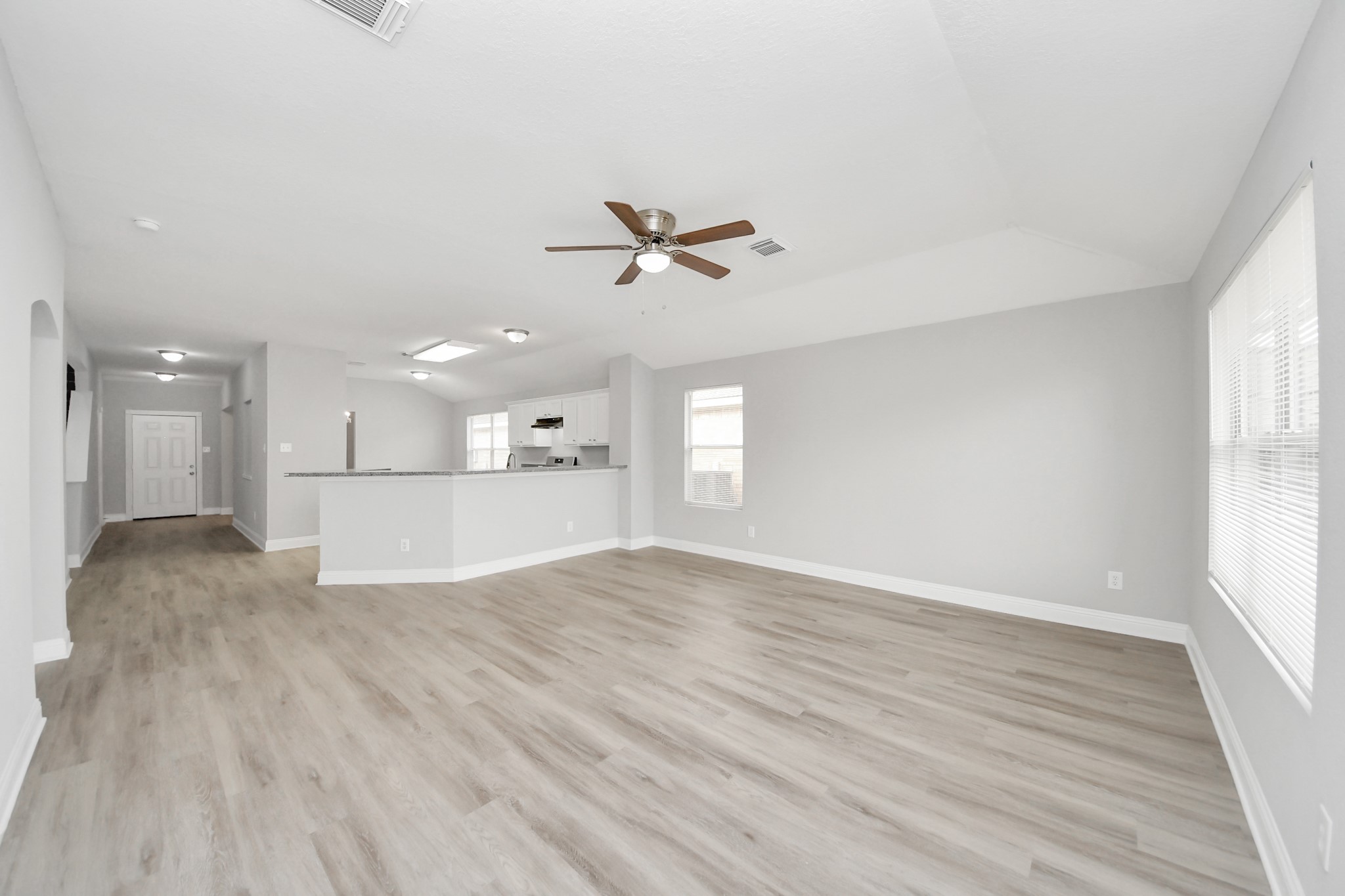 19618 Beachy Court Katy, TX 77449 - Photo 14 of 33 A comfy, open living room that's perfect for everyday moments or hosting guests!