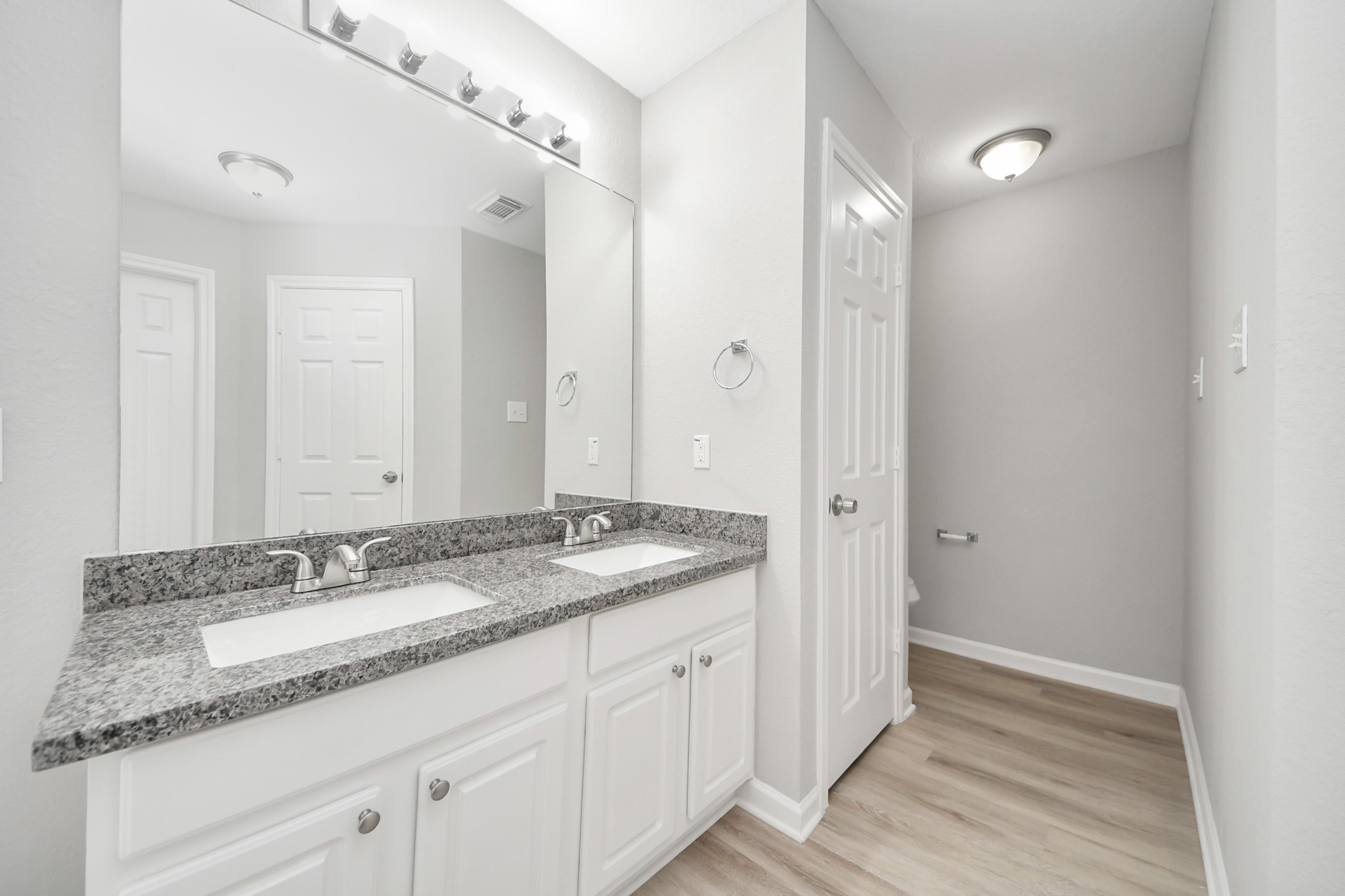 19618 Beachy Court Katy, TX 77449 - Photo 19 of 33 With dual sinks, the primary bathroom offers both luxury and convenience, making it easy to get ready!