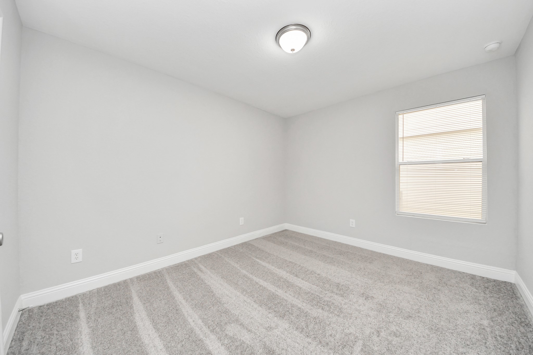 19618 Beachy Court Katy, TX 77449 - Photo 22 of 33 Another view of the secondary bedroom, showcasing its spacious layout!