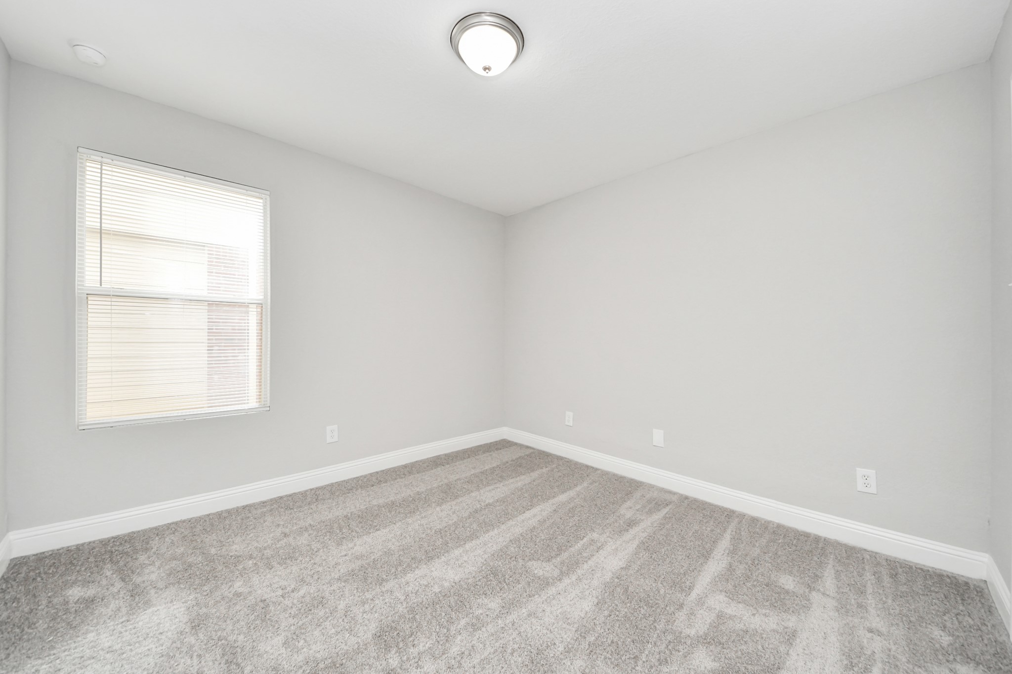 19618 Beachy Court Katy, TX 77449 - Photo 24 of 33 Another view of the secondary bedroom, showcasing its spacious layout!