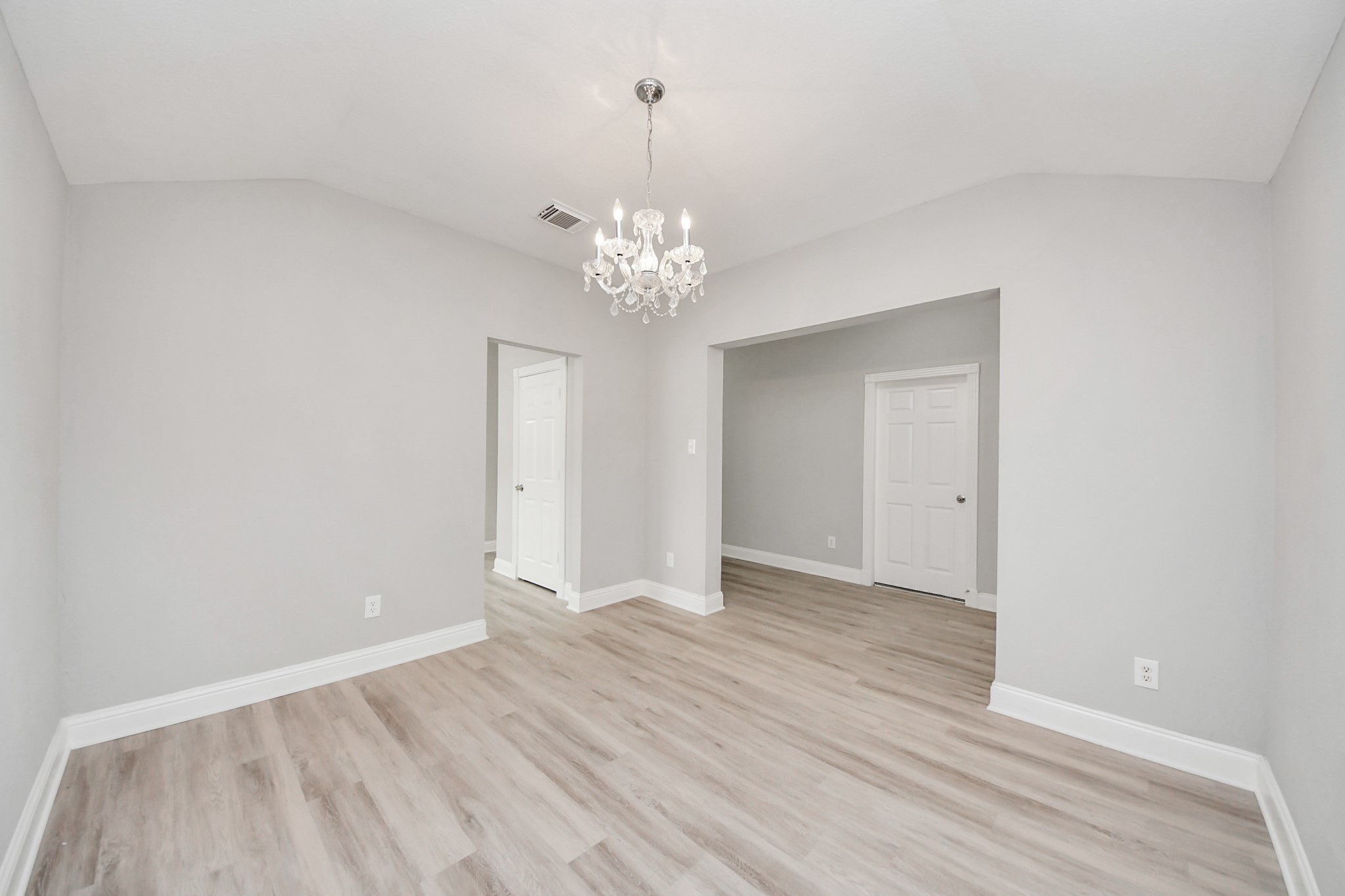 19618 Beachy Court Katy, TX 77449 - Photo 6 of 33 From this angle, you can see how the dining area flows effortlessly into the kitchen, with beautiful arches adding a touch of character and style!