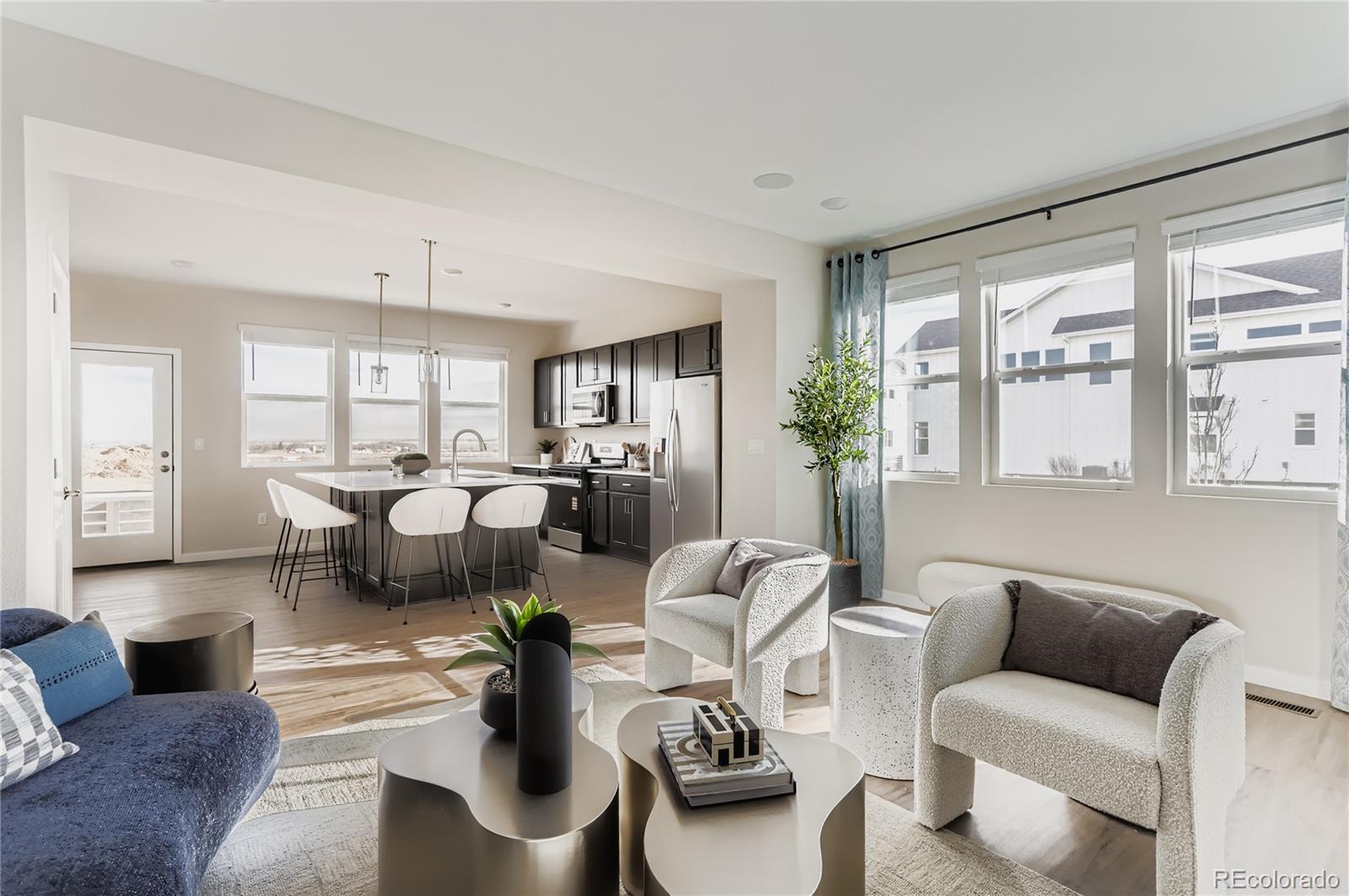 13342 Front Porch Firestone, CO 80504 - Photo 7 of 27 a living room with furniture and wooden floor