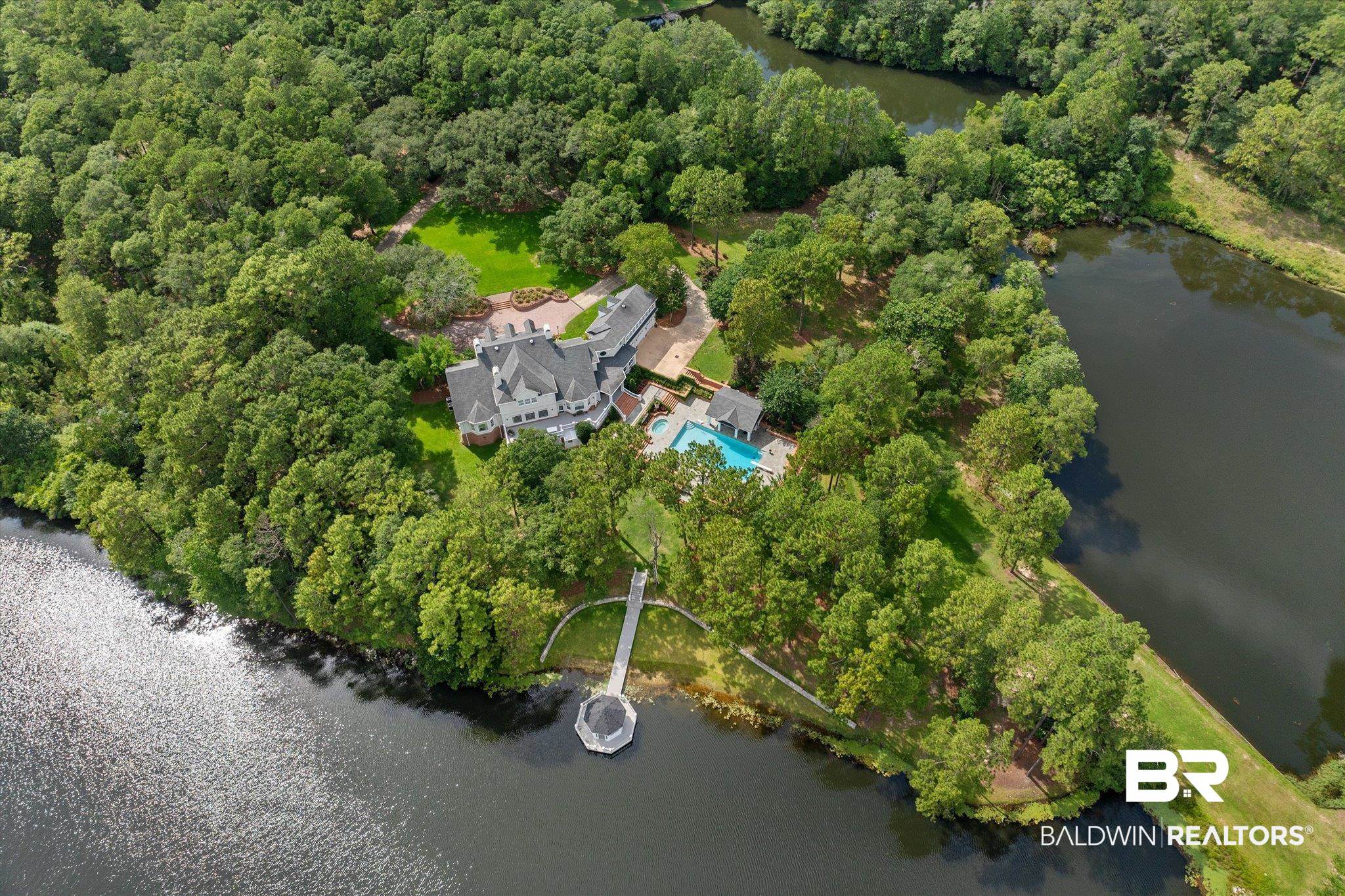 8561 Dawes Lake Road Mobile, AL 36619 - Photo 57 of 63 Aerial overview of property's location featuring a large body of water and a heavily wooded area