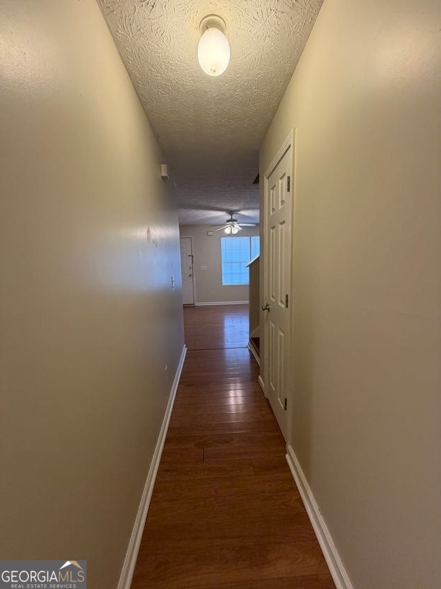 5196 Tew Lane Southwest Covington, GA 30014 - Photo 17 of 41 a view of a hallway with wooden floor