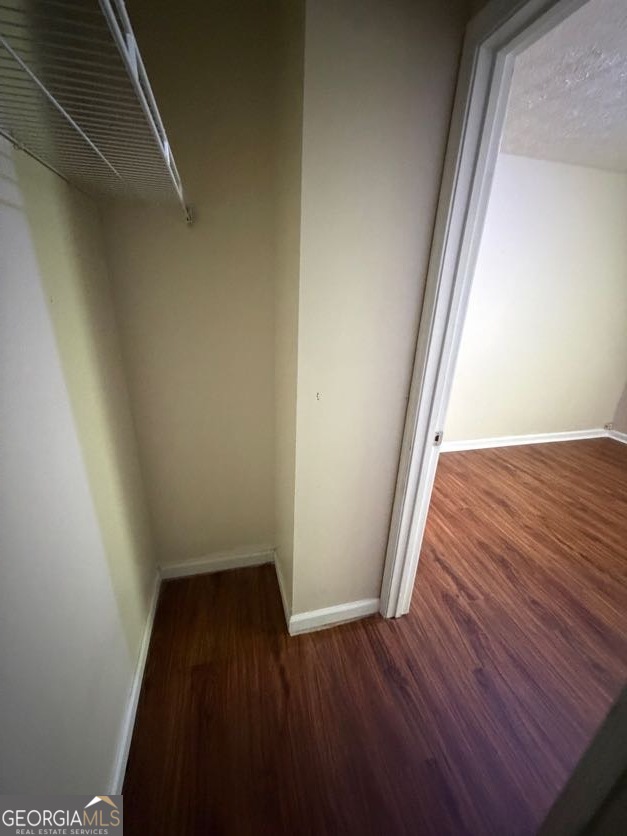 5196 Tew Lane Southwest Covington, GA 30014 - Photo 34 of 41 a view of a hallway with wooden floor