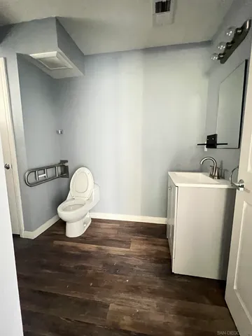 a view of bathroom with a sink and a toilet