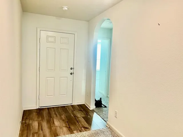 an empty room with windows