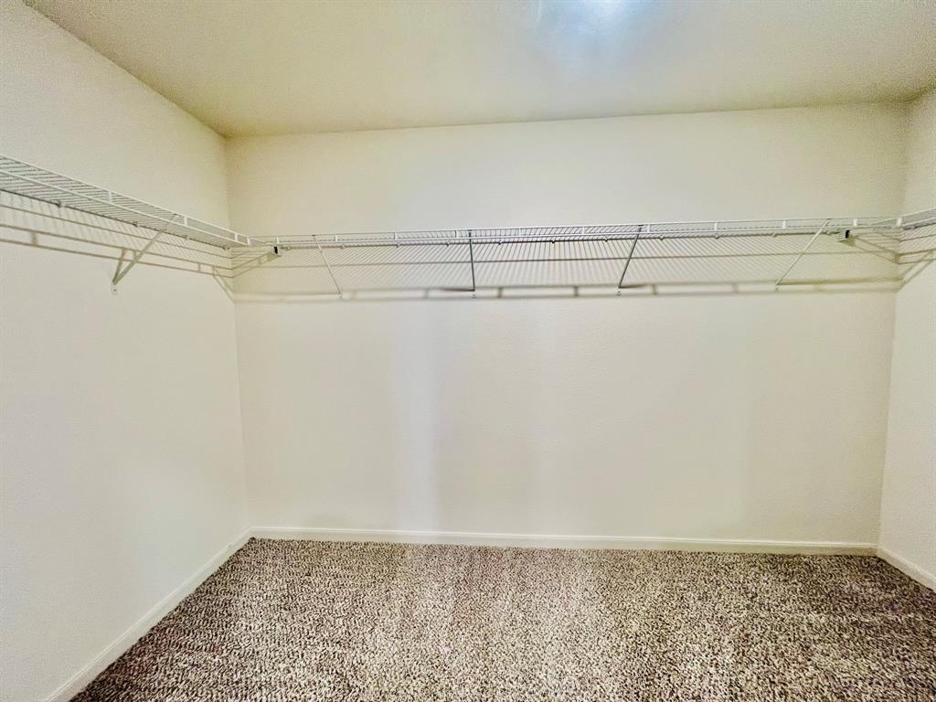 1814 Fergus Drive Ponder, TX 76259 - Photo 28 of 39 a view of a room with racks on the wall