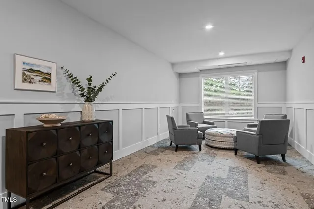 a living room with furniture and window
