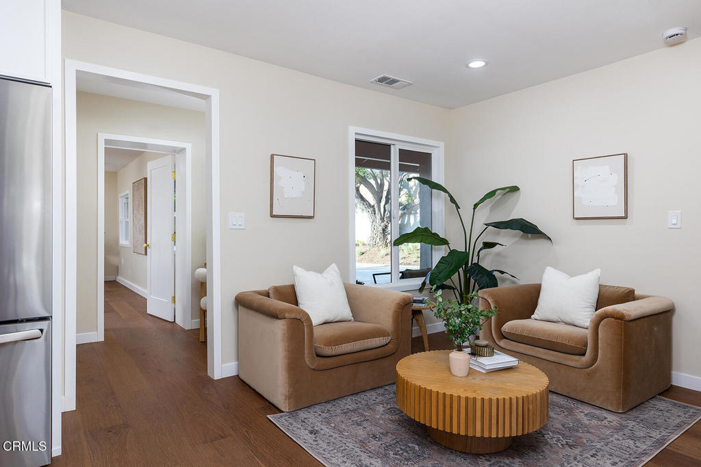 2650 Catherine Road Altadena, CA 91001 - Photo 16 of 37 a living room with furniture and a rug