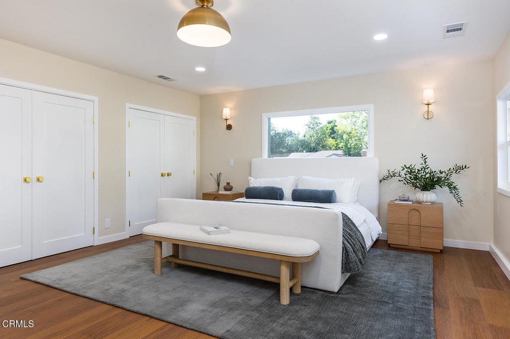 2650 Catherine Road Altadena, CA 91001 - Photo 18 of 37 a bed sitting in a spacious bedroom next to a window