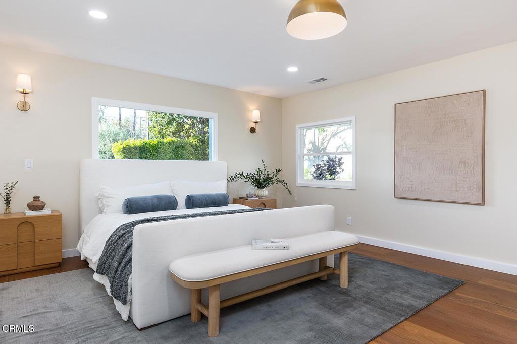 2650 Catherine Road Altadena, CA 91001 - Photo 19 of 37 a spacious bedroom with a bed and a window