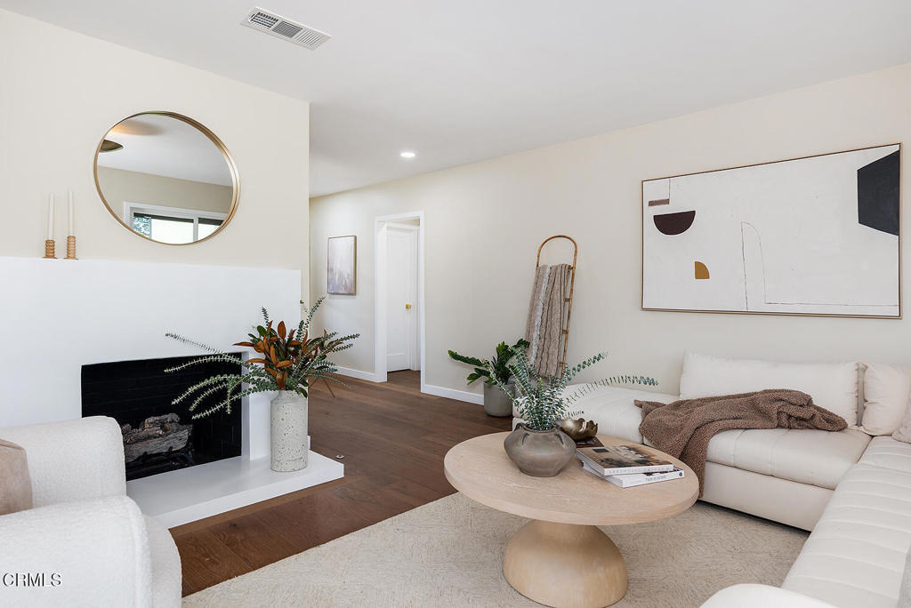 2650 Catherine Road Altadena, CA 91001 - Photo 5 of 37 a living room with furniture potted plant and a mirror