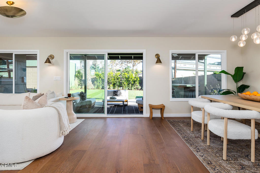 2650 Catherine Road Altadena, CA 91001 - Photo 8 of 37 a living room with furniture and large windows