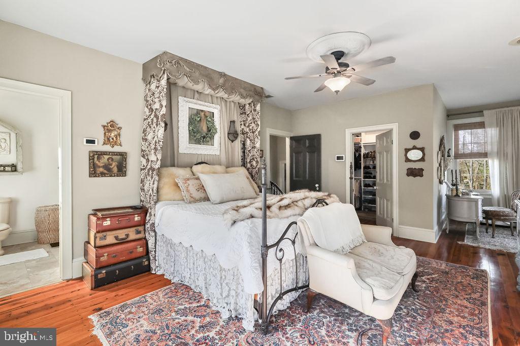 9 Eayrestown Road Medford, NJ 08055 - Photo 45 of 78 a spacious bedroom with a bed and ceiling fan