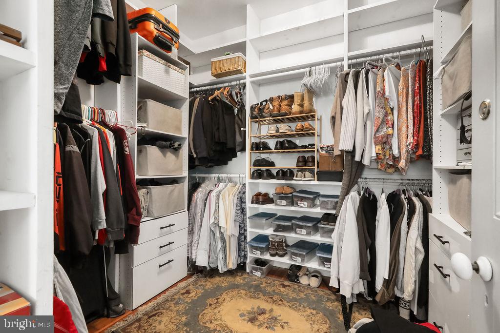 9 Eayrestown Road Medford, NJ 08055 - Photo 48 of 78 a view of walk in closet with clothes and shoes