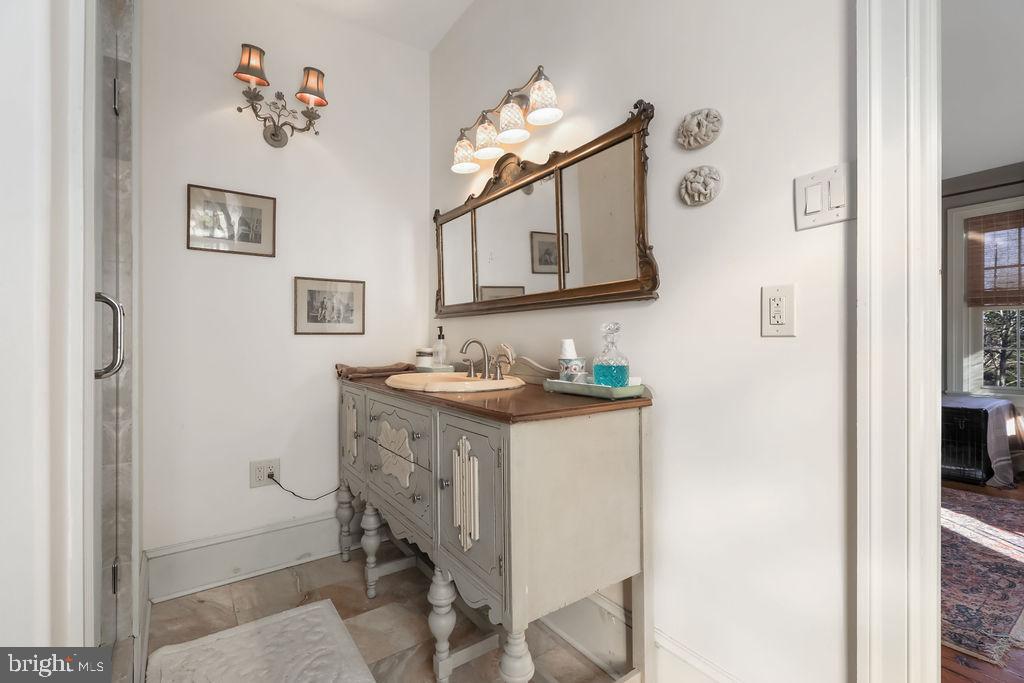 9 Eayrestown Road Medford, NJ 08055 - Photo 51 of 78 a bathroom with a sink vanity and a mirror