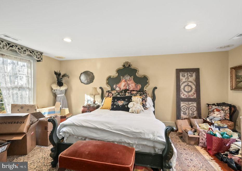 9 Eayrestown Road Medford, NJ 08055 - Photo 57 of 78 a bedroom with a bed and wooden floor