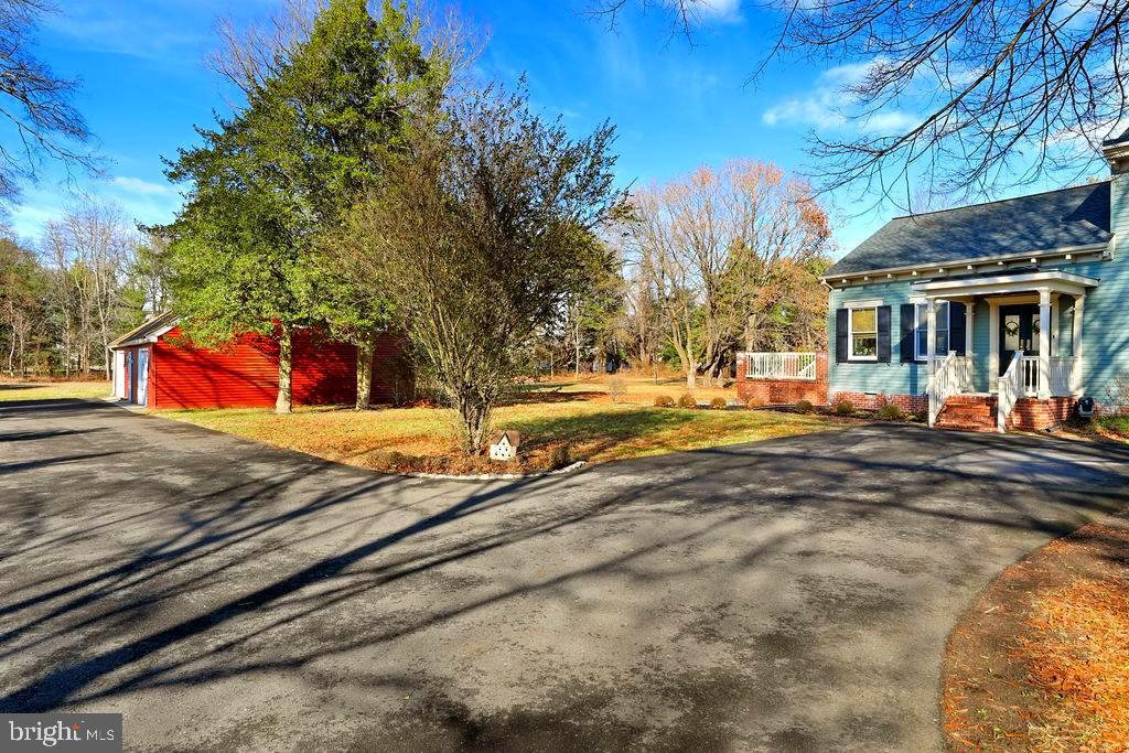 9 Eayrestown Road Medford, NJ 08055 - Photo 67 of 78 a view of a yard with cars