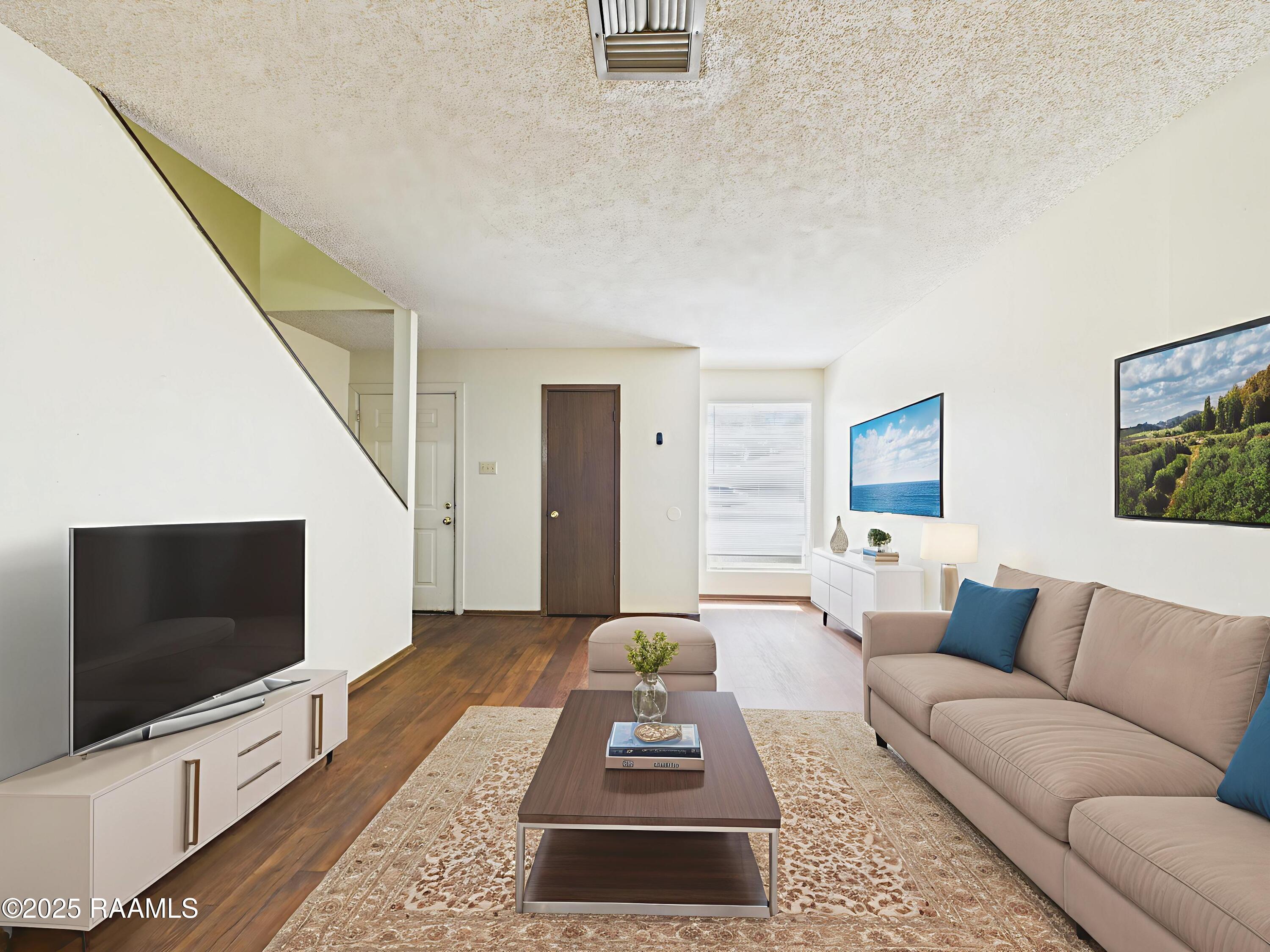 201 High Meadows Boulevard, Unit 218 Lafayette, LA 70507 - Photo 2 of 16 Living room (19)