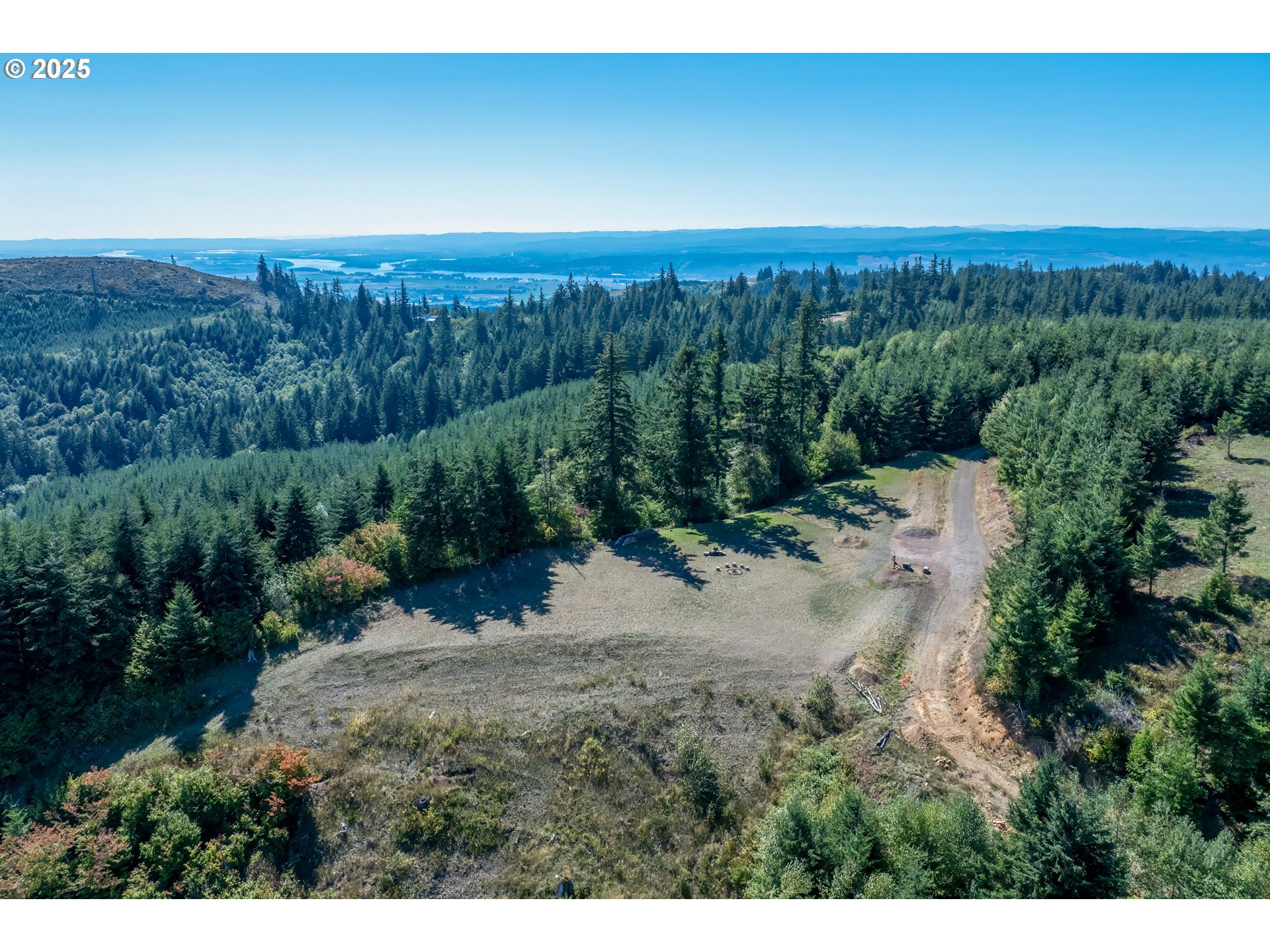 787 Five Peaks Drive Kalama, WA 98625 - Photo 3 of 14 a view of a yard with a street