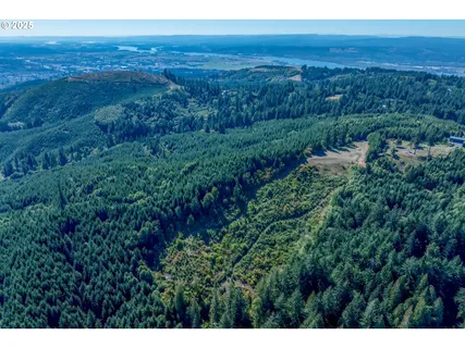 a view of a city with an ocean