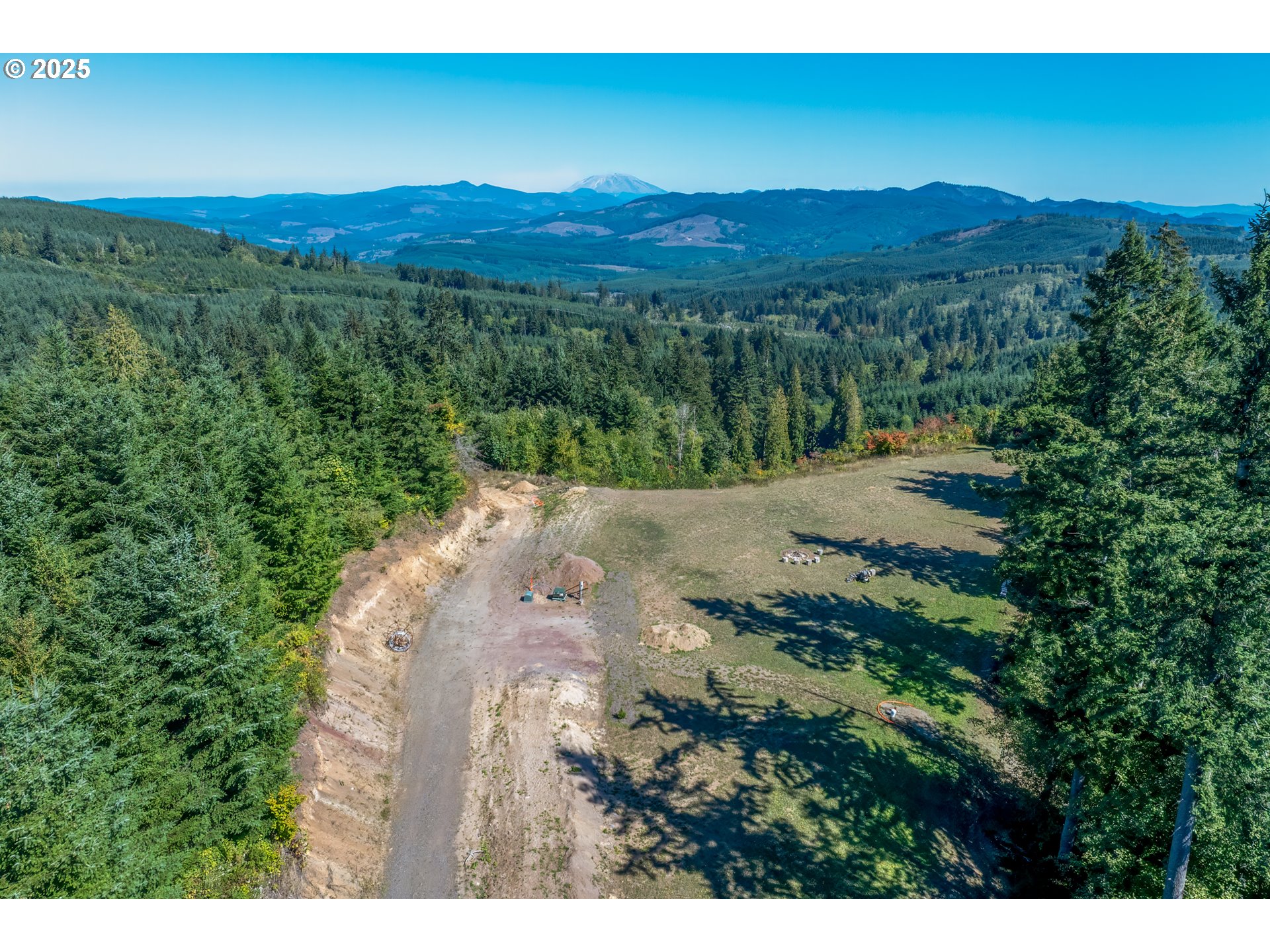 787 Five Peaks Drive Kalama, WA 98625 - Photo 10 of 14 a view of a lake with a city