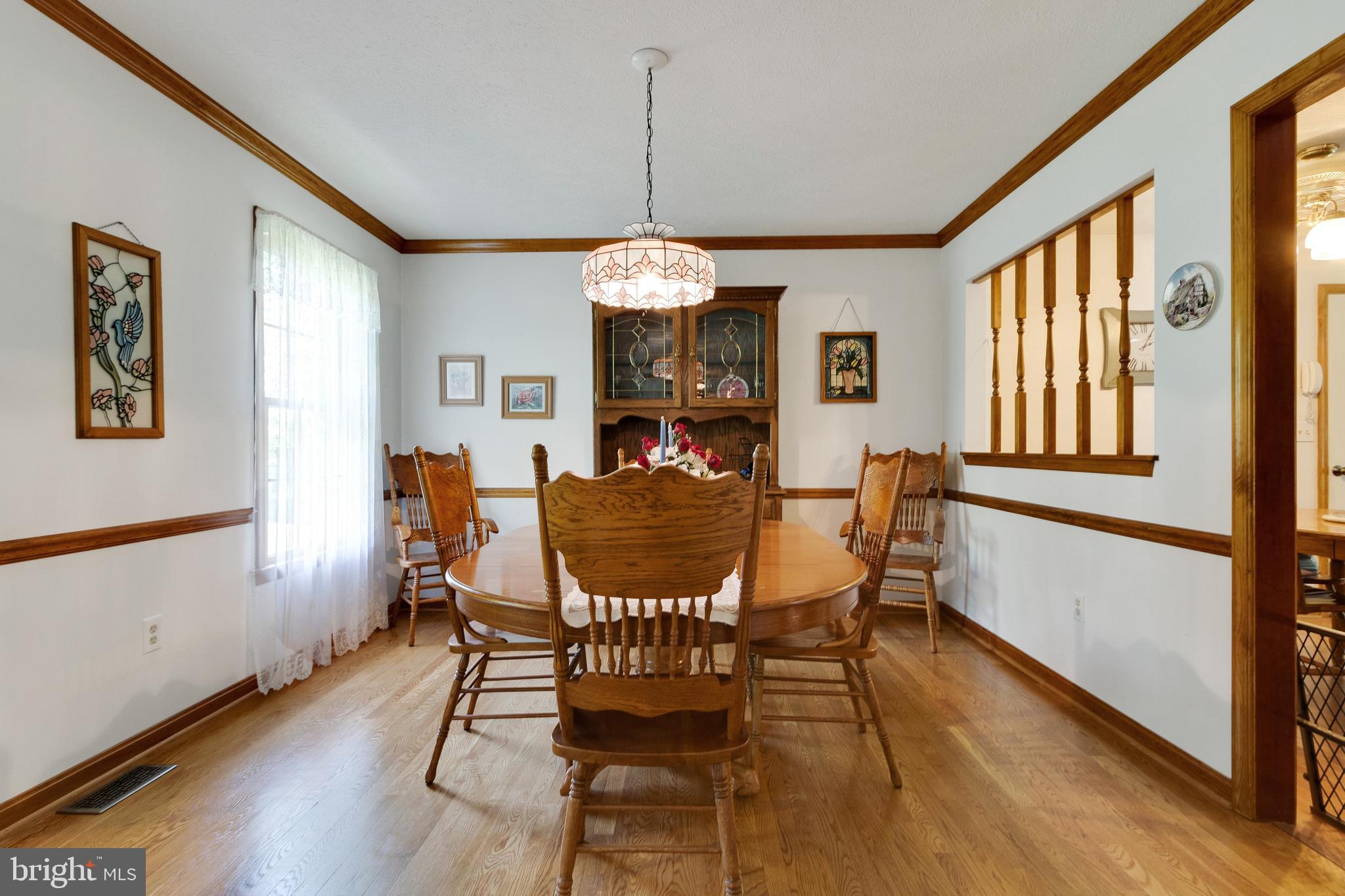17161 Hudson Mill Road Culpeper, VA 22701 - Photo 7 of 42 Formal Dining room with gleaming hardwood floors