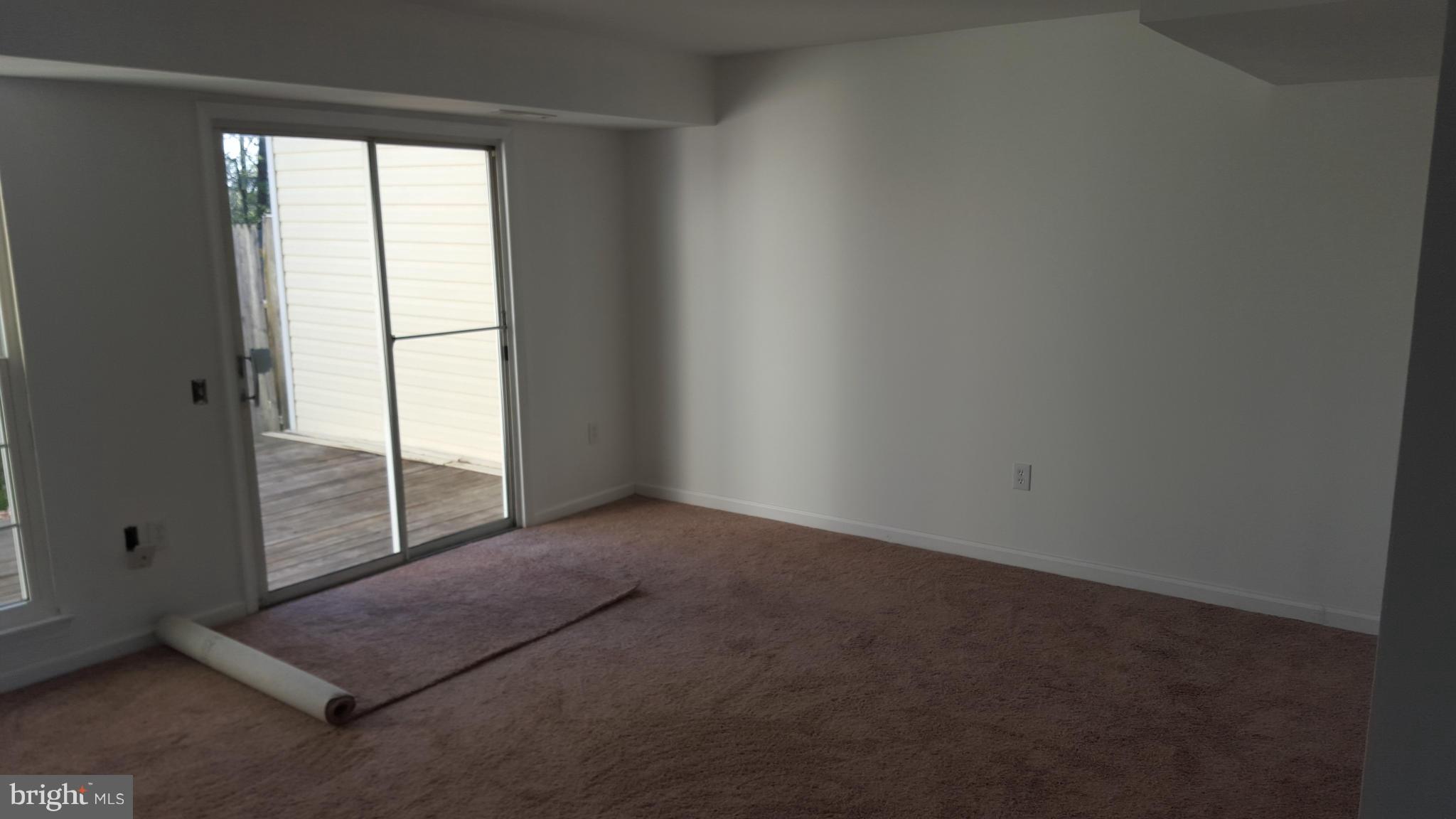 3855 Kearnys Inn Place Waldorf, MD 20602 - Photo 5 of 8 an empty room with windows
