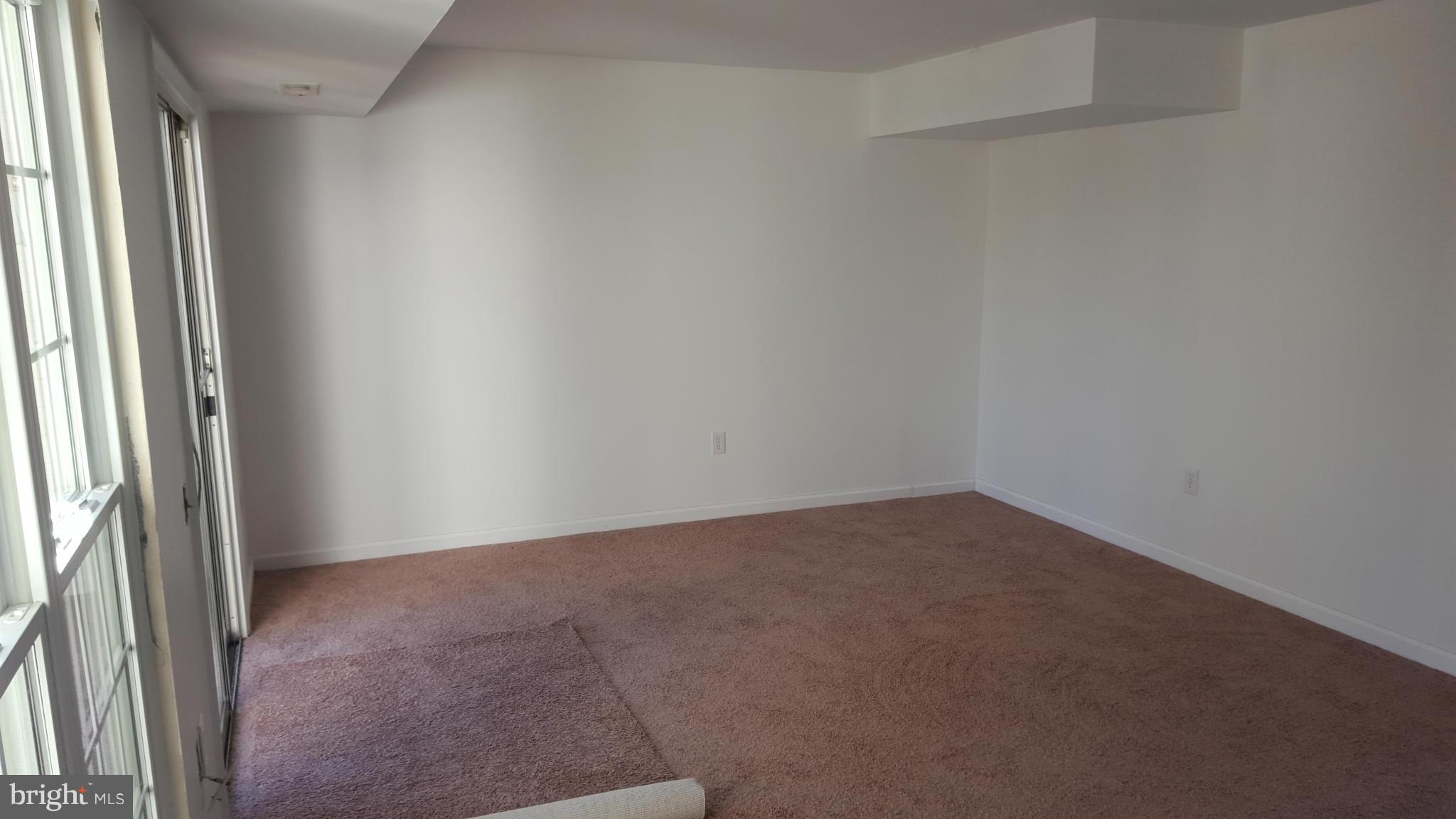 3855 Kearnys Inn Place Waldorf, MD 20602 - Photo 6 of 8 a view of an empty room and a window