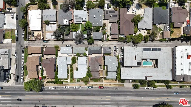 an aerial view of a city with lots of residential buildings