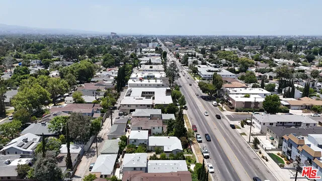 an aerial view of a city with lots of residential buildings