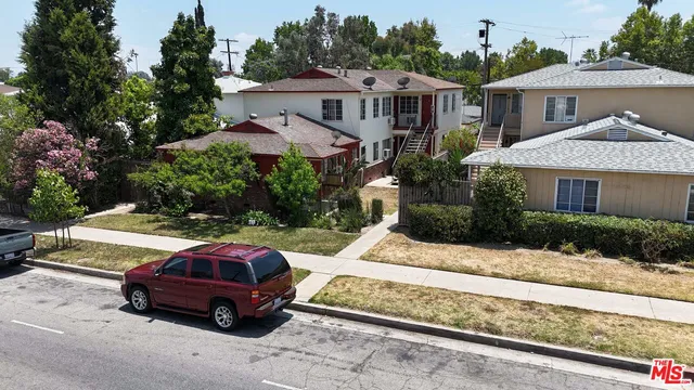 a car parked in front of a house