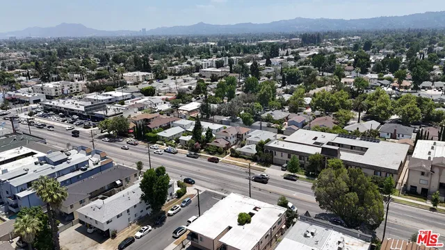 an aerial view of a city with lots of residential buildings