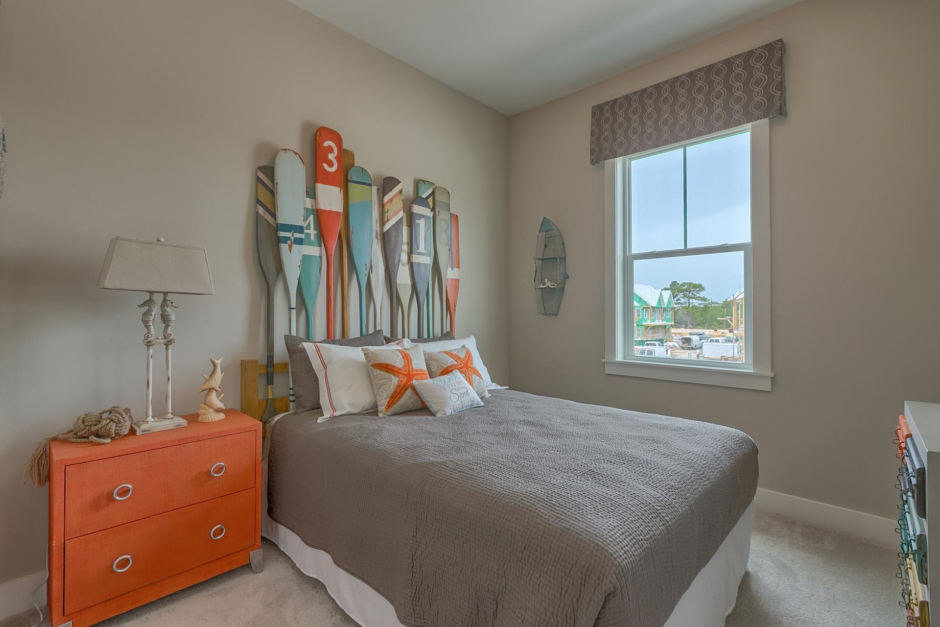 25 East Milestone Drive Inlet Beach, FL 32461 - Photo 18 of 40 a bedroom with a bed and a window
