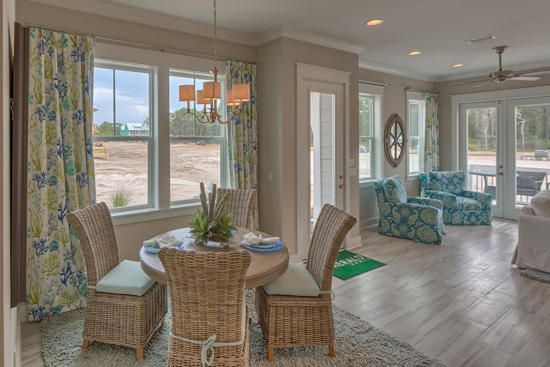 25 East Milestone Drive Inlet Beach, FL 32461 - Photo 24 of 40 a view of a dining room with furniture window and wooden floor