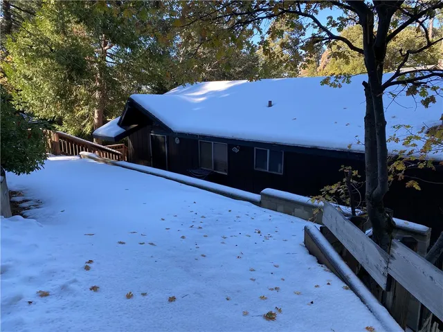 a view of swimming pool with outdoor seating
