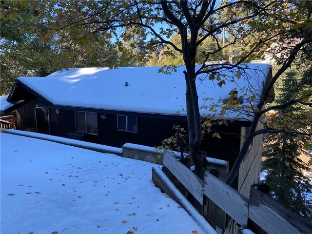 a view of balcony with wooden floor