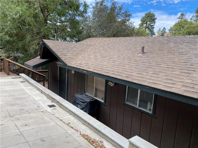 a terrace with wooden fence