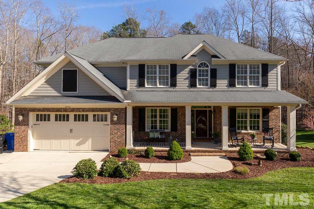 2924 Sunnystone Way Raleigh, NC 27613 - Photo 2 of 30 a view of a house with garden and porch