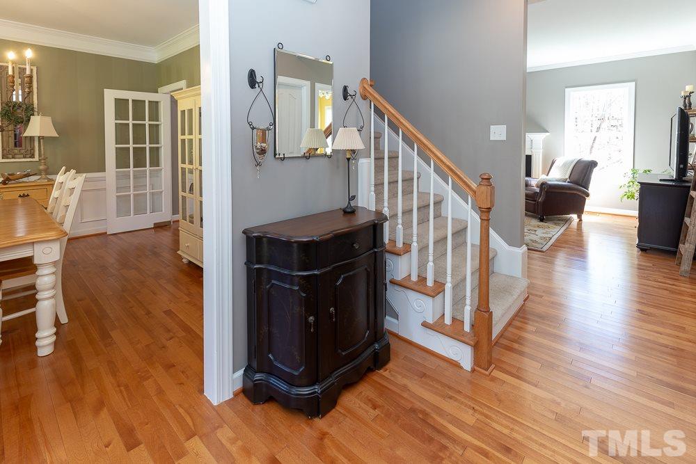 2924 Sunnystone Way Raleigh, NC 27613 - Photo 3 of 30 a view of entryway and hall with wooden floor