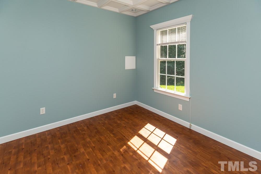 2924 Sunnystone Way Raleigh, NC 27613 - Photo 22 of 30 an empty room with windows