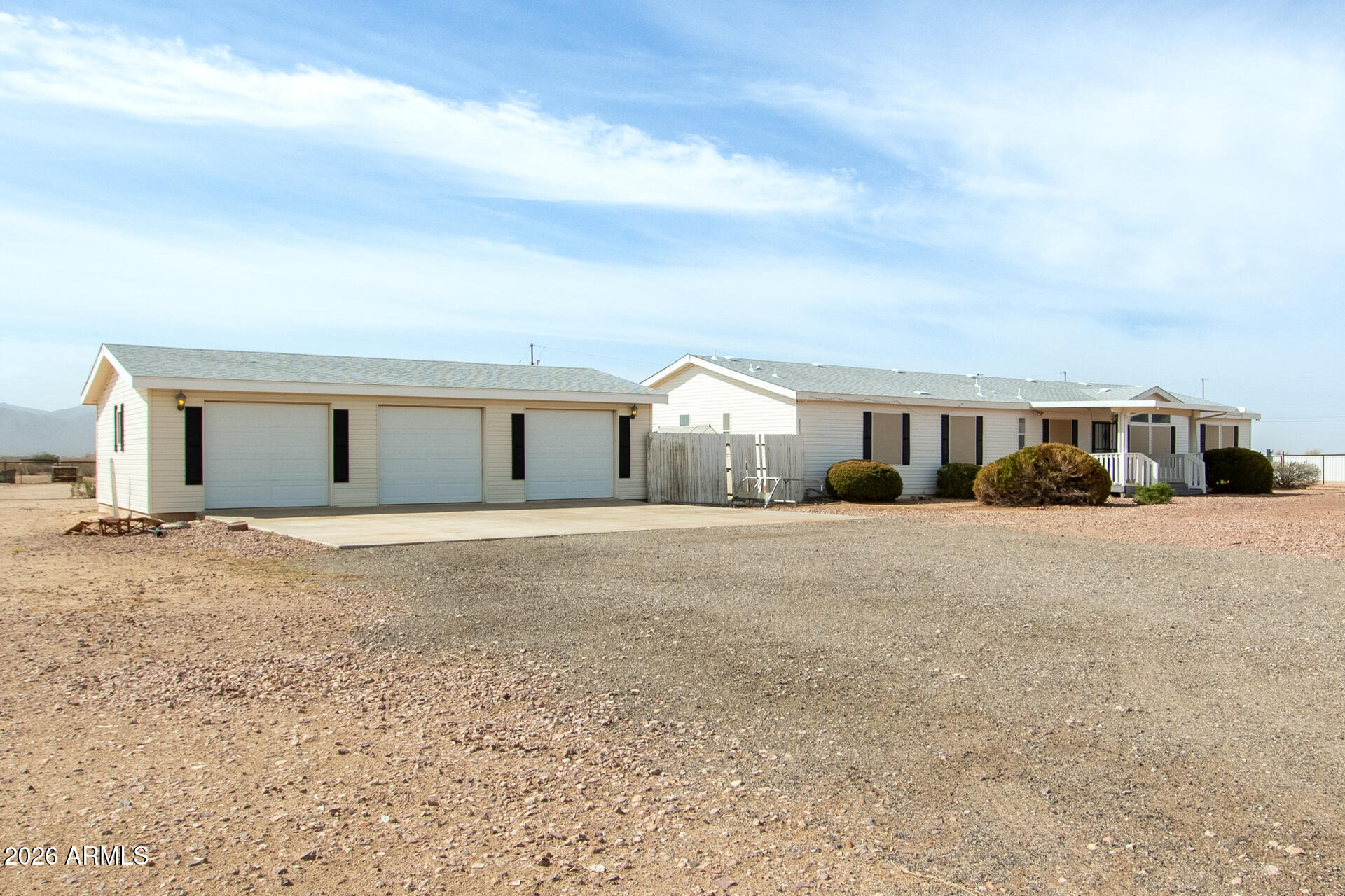 23851 West Tether Trail Wittmann, AZ 85361 - Photo 1 of 44 front view of a house with a street