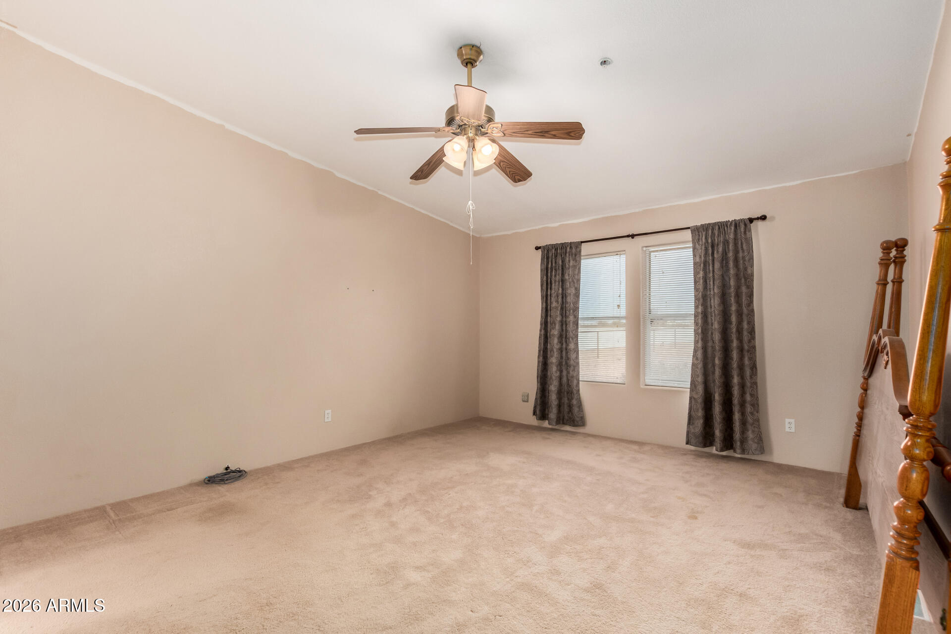 23851 West Tether Trail Wittmann, AZ 85361 - Photo 21 of 44 a view of an empty room with a window